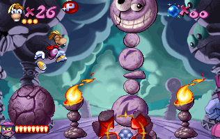 Rayman usa il masso per colpire la testa di pietra.
