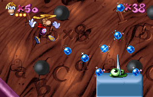 Rayman utilisant son hélicoptère pour atteindre une gomme surélevée.