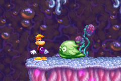 Un slime vert fonçant sur Rayman.