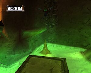 Rayman doit escalader le mur devant lui pour rejoindre la salle secrète.