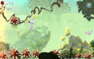 Des fleurs piquantes rouges dans un niveau en mode Challenges de Rayman Mini.