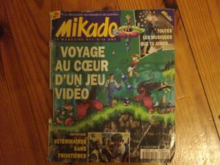 Couverture du magazine Mikado d'octobre 1995 avec, tout à gauche, un personnage retiré du premier jeu Rayman qui ressemble beaucoup à Cookie.