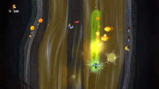Murfy étalant du guacamole pour protéger Rayman des boules de feu.
