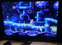 Photographie prise par Michel Ancel de son écran faisant tourner la cartouche de la version Super NES du premier jeu Rayman conservée par Frédéric Houde.