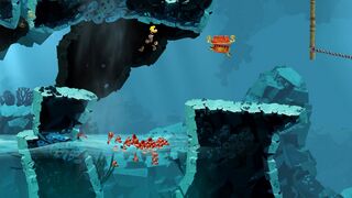 Des petits piranhas rouges dans Au cœur de l'abysse (Retour aux Origines).