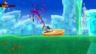 Rayman utilisant son hélice pour faire avancer une énorme moitié d'orange sur un lac de la Terre gourmande dans la bande-annonce de Rayman Origins diffusée à l'E3 2011.