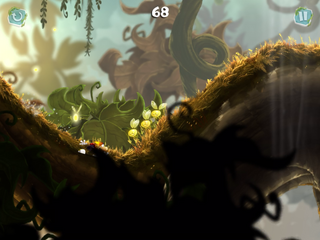 Rayman glissant sur une branche.