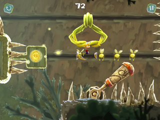 Rayman doit attendre que cette pièce de la mort le touche et bondir aussitôt pour éviter les pointes acérées qui arrivent juste derrière.