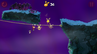 Rayman sur une tyrolienne.