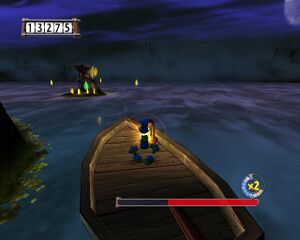 Rayman usa un pequeño barco para llegar a la isla secreta.