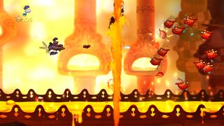Un grand groupe de petits dragons juste au-dessus d'une étendue de feu.