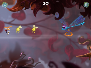 Rayman volant vers une libellule dans un courant d'air soufflant vers la droite.