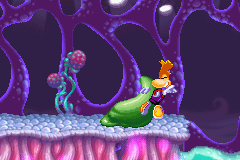A green slime attacking Rayman.