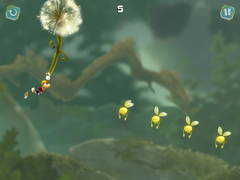 Rayman gliding on a dandelion.