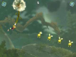 Rayman gliding on a dandelion