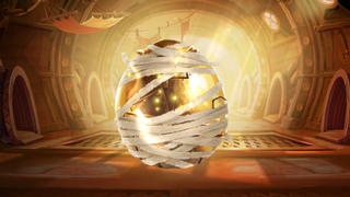 A gold Surprise Sarcoph-Egg-Us ready for hatching.