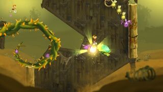 Rayman jumping towards a bouncy flower.