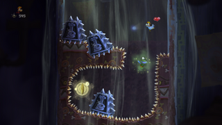 A Skull Coin next to sharp obstacles and a large cake.