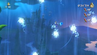 Rayman maneuvering past electric balls.