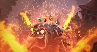 Rayman, Barbara and a Teensie on a pile of defeated enemies.