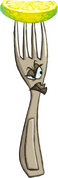 Detailed view of a fork stuck into a lemon slice
