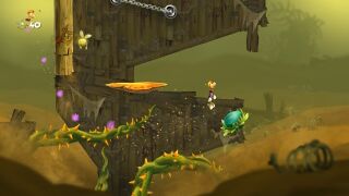 Rayman jumping away from Darkroots.