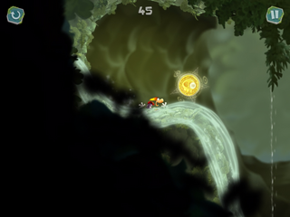 Rayman sliding towards a Skull Coin
