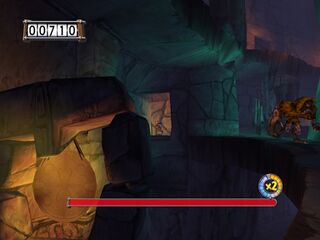 Rayman using gongs to distract the Knaarens.